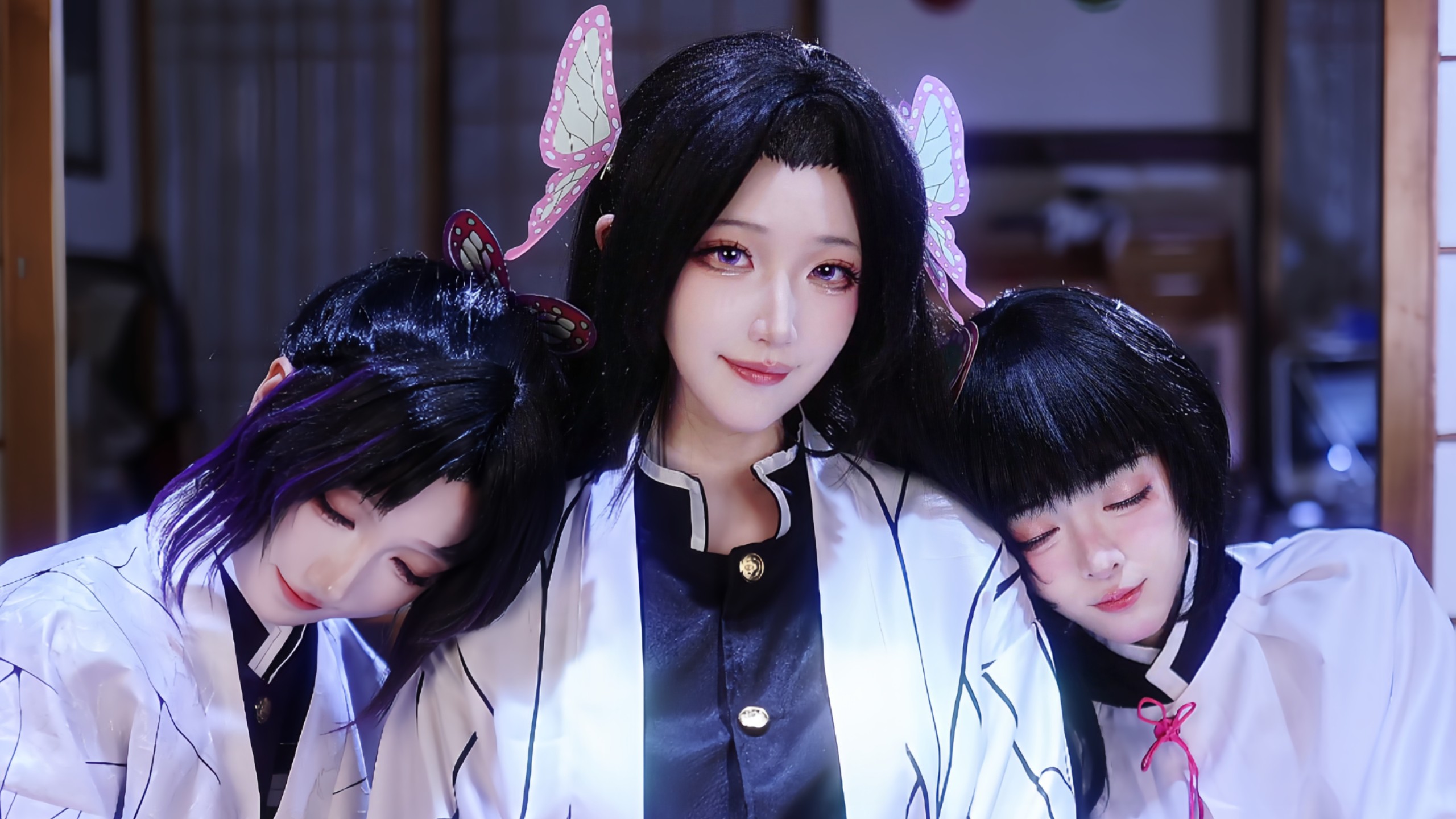 Pink Butterfly goes, Purple Butterfly follows, Young Butterfly wants to chase but is stopped.