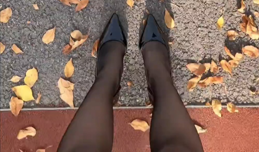 Wearing black silk high heels to the park turns heads.
