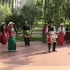 龙潭公园热爱民族舞的爱好者，跳起藏族喜庆丰收的民间舞