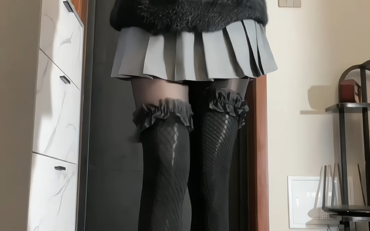 Sweater with pleated skirt