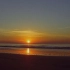 c702 金色海面海洋海水波浪波涛冲刷沙滩浪花海上日出日落蓝天白云云霞云彩清晨傍晚视频素材