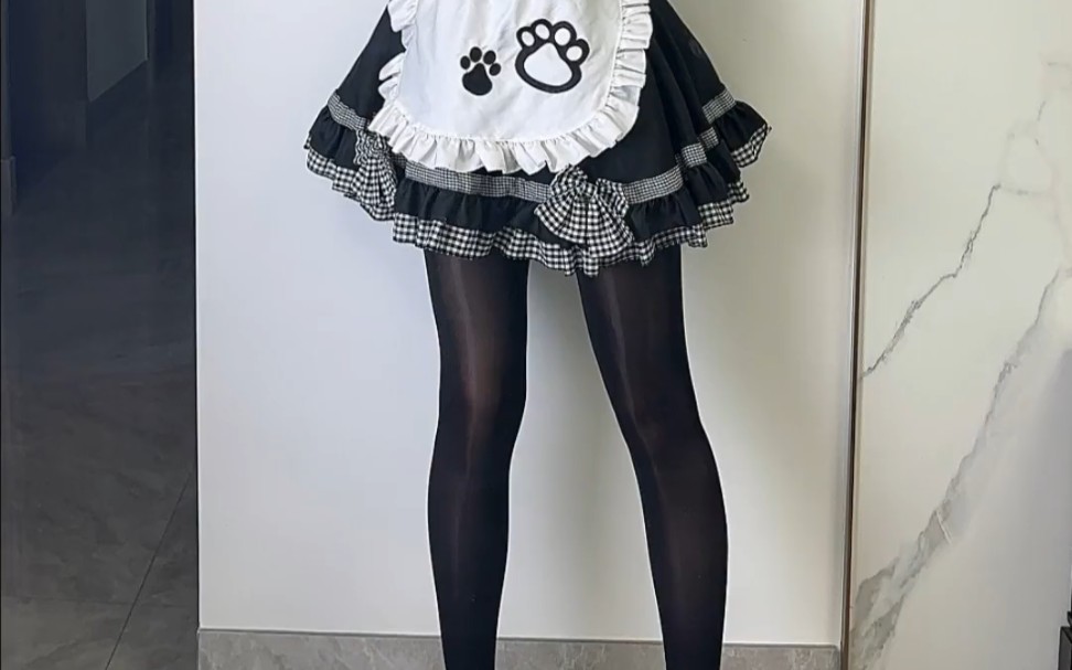 Have a nice dream in a thick black stockinged maid's outfit.