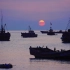 江苏连云港，日落是一曲渔舟唱晚，海面是一幅星夜油画