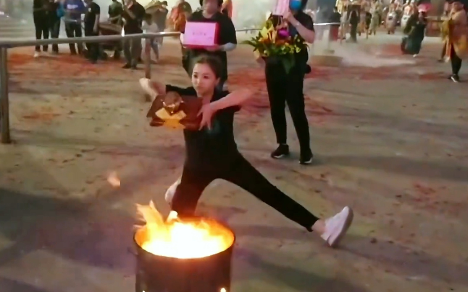 Positive girl's clean stove hand is full of strength and steady on her feet