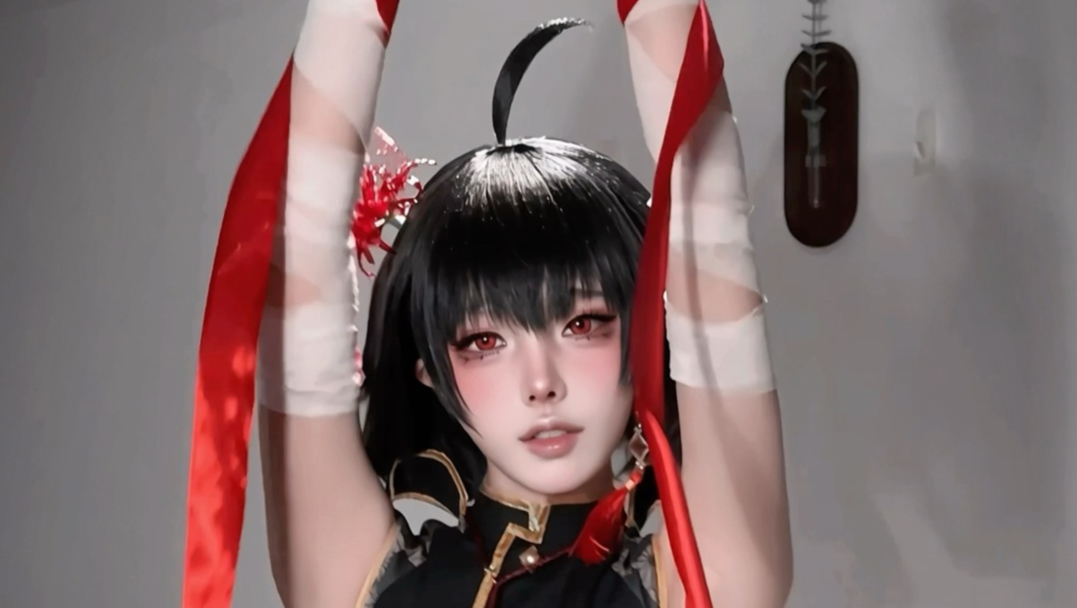 Red ribbon + little boy = ?