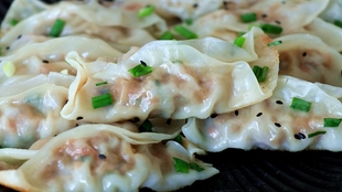 如何简单快速包饺子 9ee5e772fb62e3faa4cef2313ab903be2e3e1663.jpg@310w_174h_1c_100q.jpg