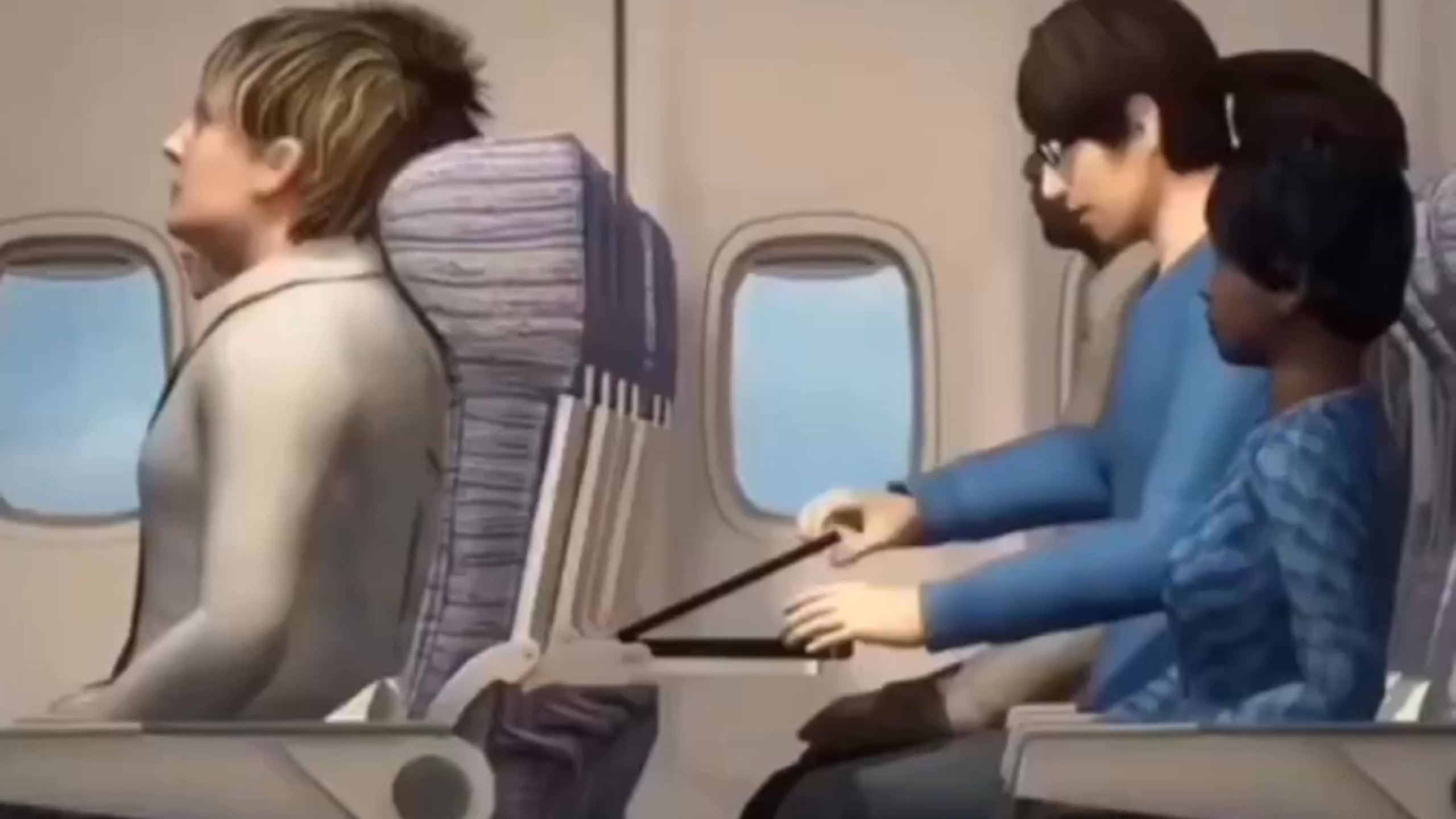 注意看这个男人在飞机上打DMZ时……