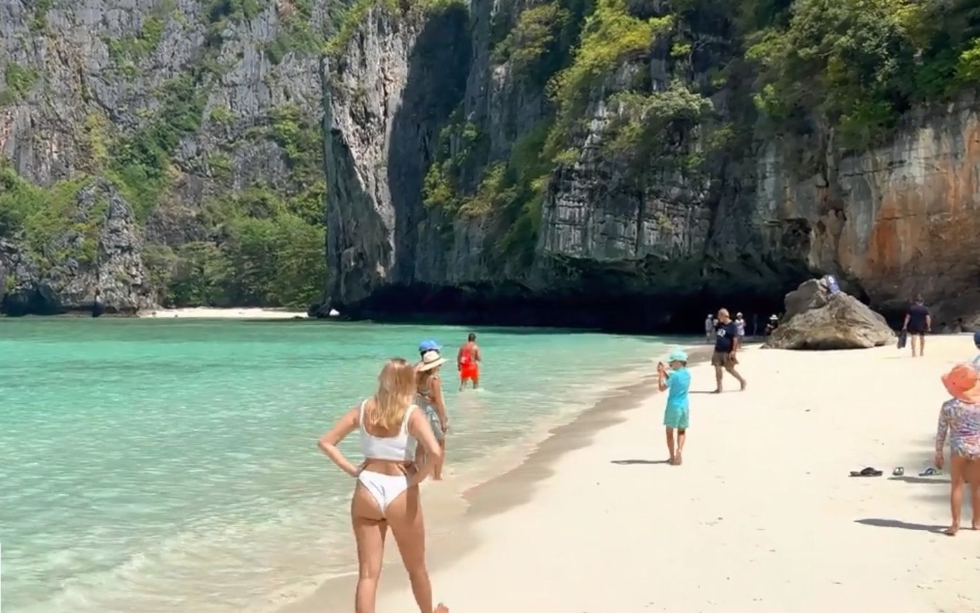 Sun, sand, waves and some bikinis.