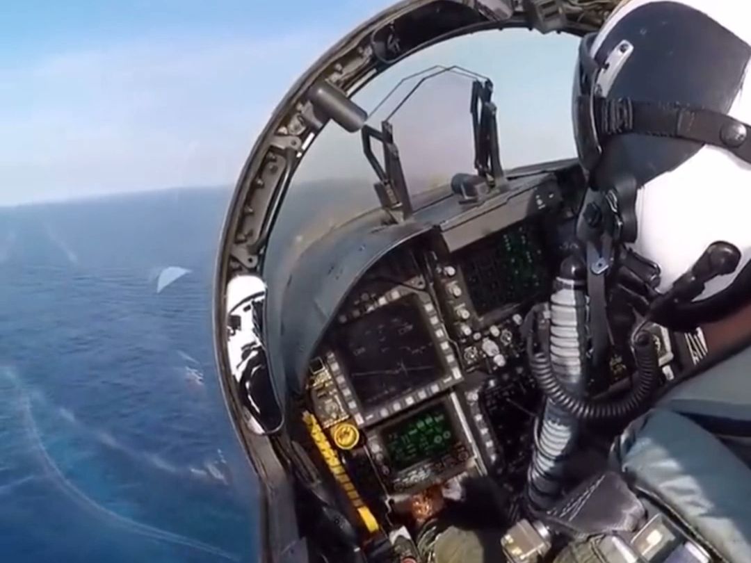 First look at an airplane landing on an aircraft carrier