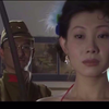 在鬼子的强迫下，女孩含泪脱光了衣服承受一切