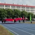 校运会开幕式，7名学生高举五星红旗奔跑在赛道上，瞬间点燃全场。