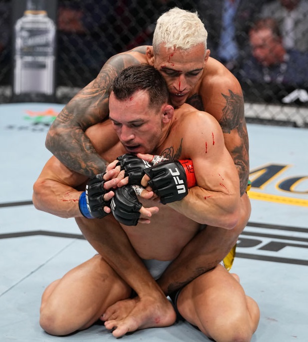 ufc262期出场费林志炫vs钱德勒空缺轻量级金腰带鳄鱼手臂骨折