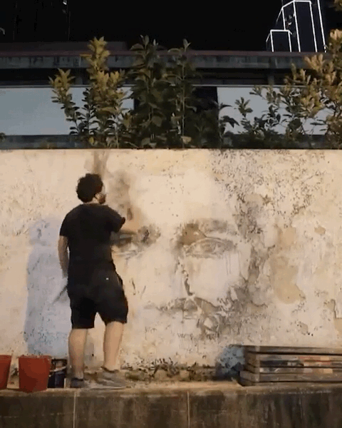 对话街头艺术家vhils在城市破坏中捕捉人文印记