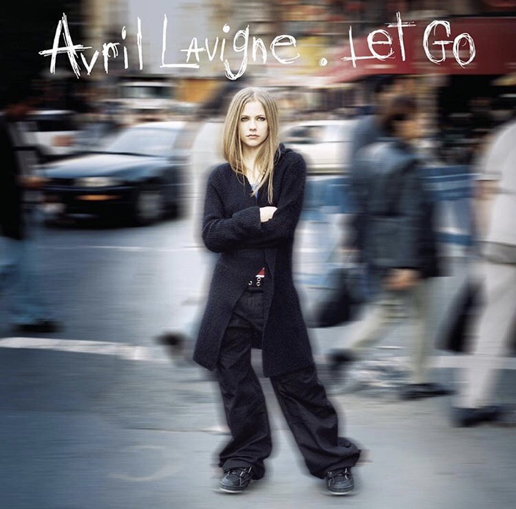 艾薇儿领进去的 她的第一张专辑是在2002年发行的"let go(远走高飞)