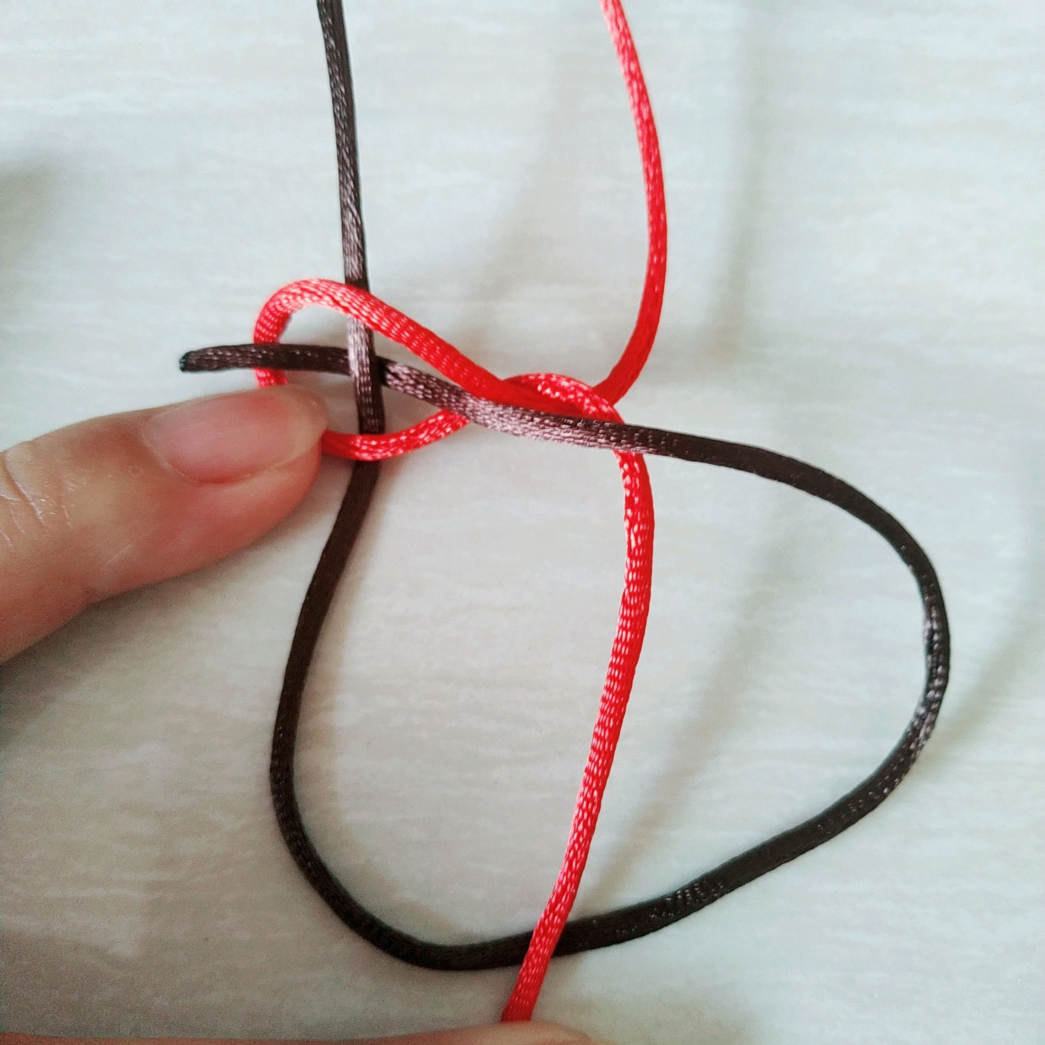 双线纽扣结编织过程