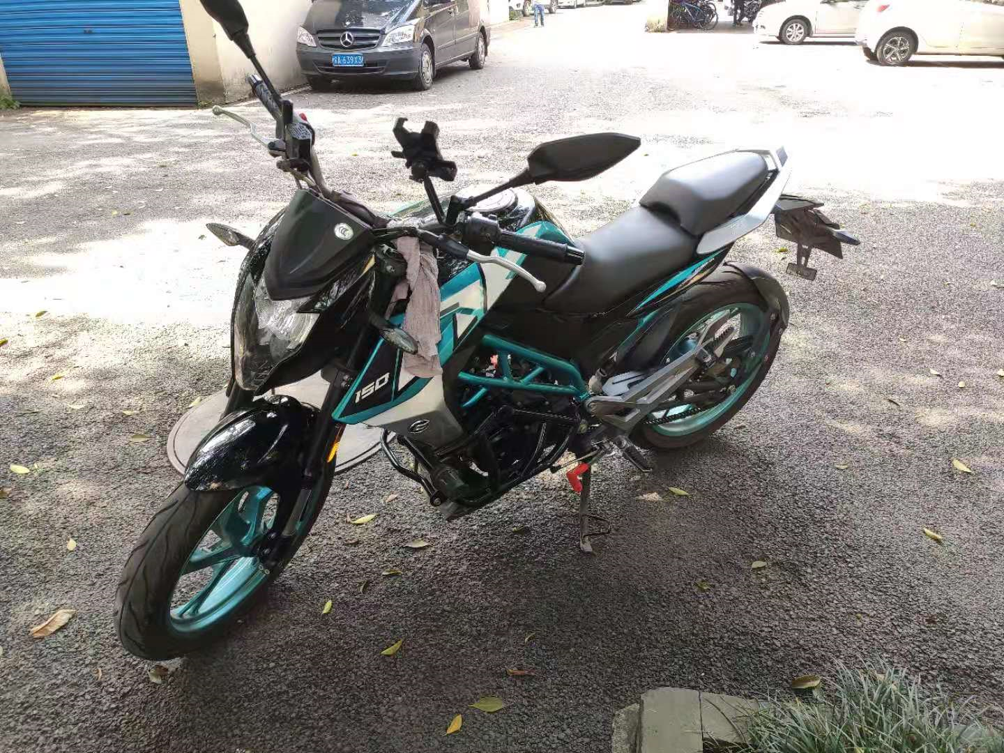 春风150nk更换电瓶图解