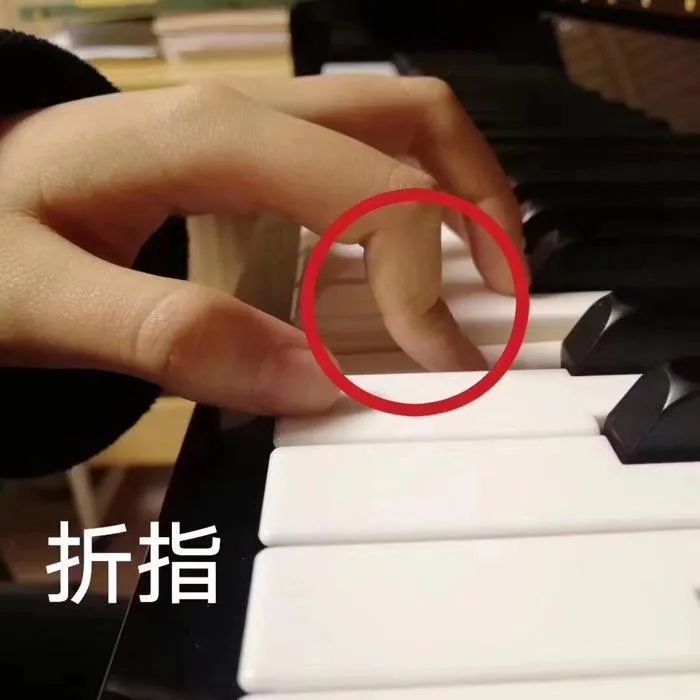 钢琴老师总说我弹钢琴的手型不对,请问正确的手型是什么样的?
