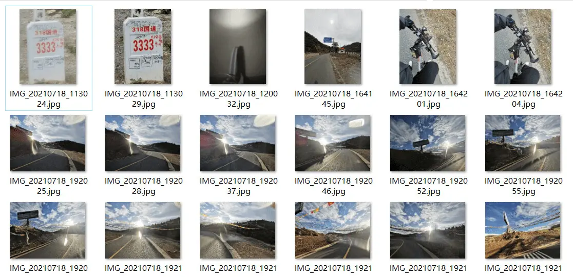 我为什么在这个垭口拍了这么多照片呢,因为当绕过最后一道弯看到那束阳光时,像是得到救赎般如释重负,当时自行车上带的士力架和红牛都吃完了,肚子也开始发饿,腿也蹬不动踏板了。转过弯看到永不缺席的经幡时,我才知道终于爬到山顶了。