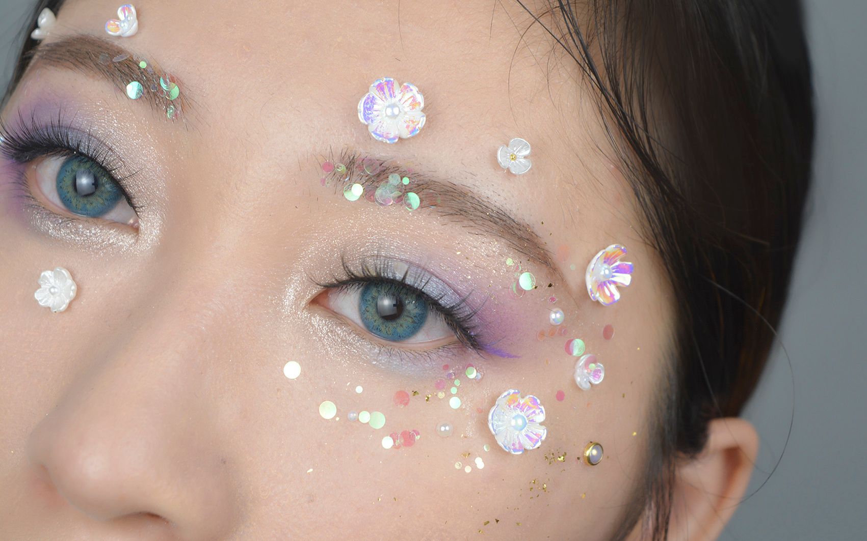 仙气十足的梦幻紫色琉璃花创意妆容