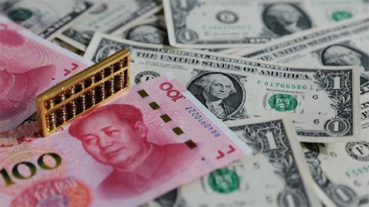 在岸人民币兑美元跌破7.0关口,为2020年7月以来首次