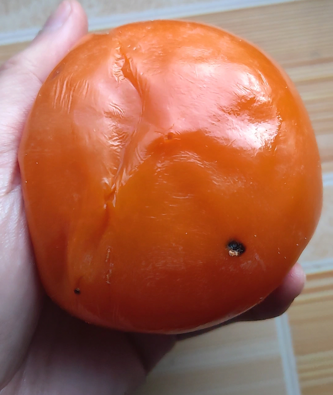 柿子要挑软的捏