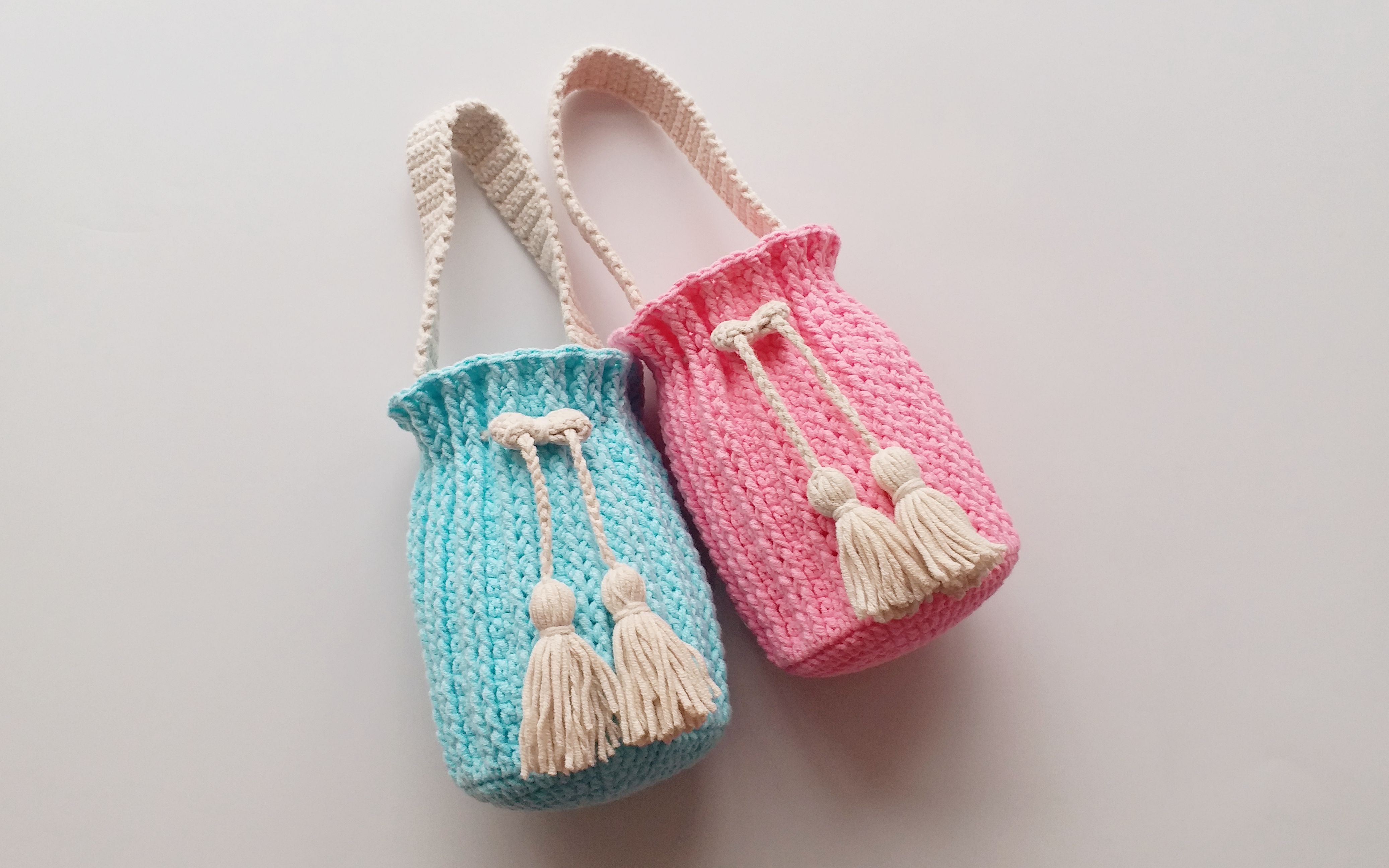 毛线钩织手拎袋,能当水杯套,束口设计 流苏绳,实力与颜值并存