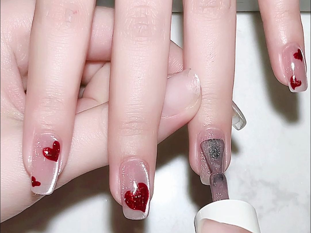 可爱猫眼爱心新年美甲