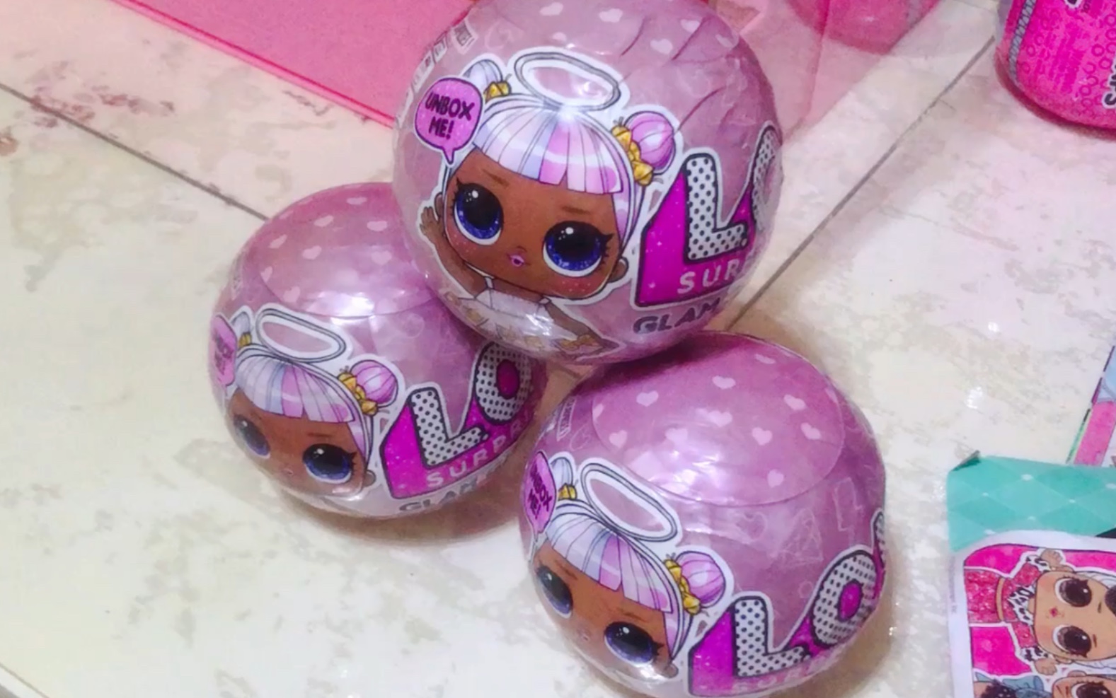 粉色lol惊喜拆拆球3连拆!