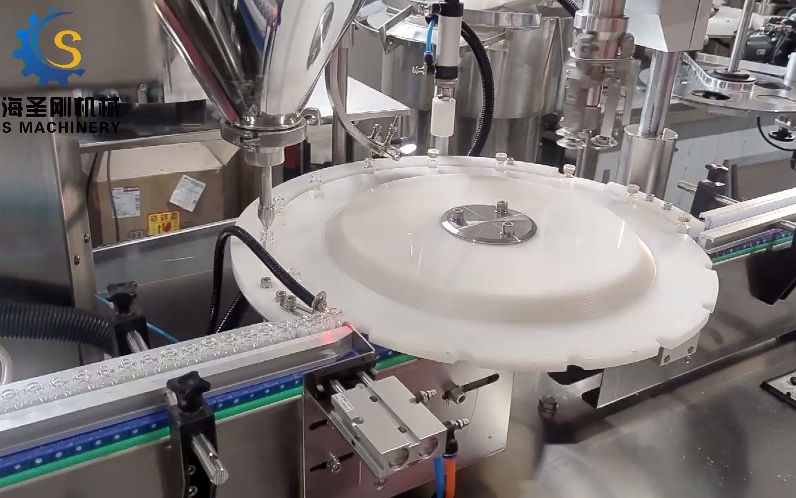 圣刚粉末灌装封口压盖一体机 小剂量粉剂灌装机 生产实拍