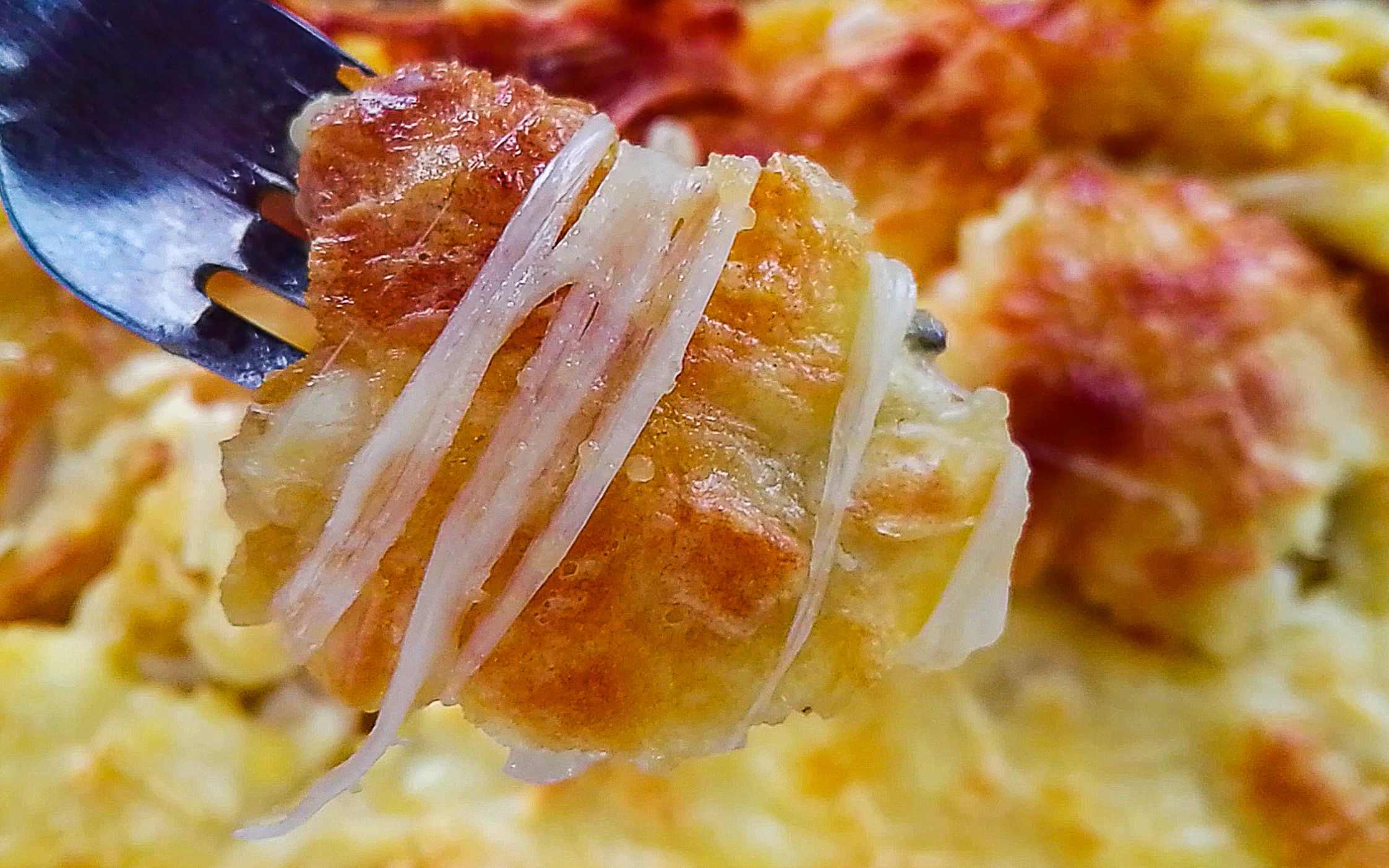 能拉丝的焗红薯,奶香浓郁,是女士和孩子的最爱