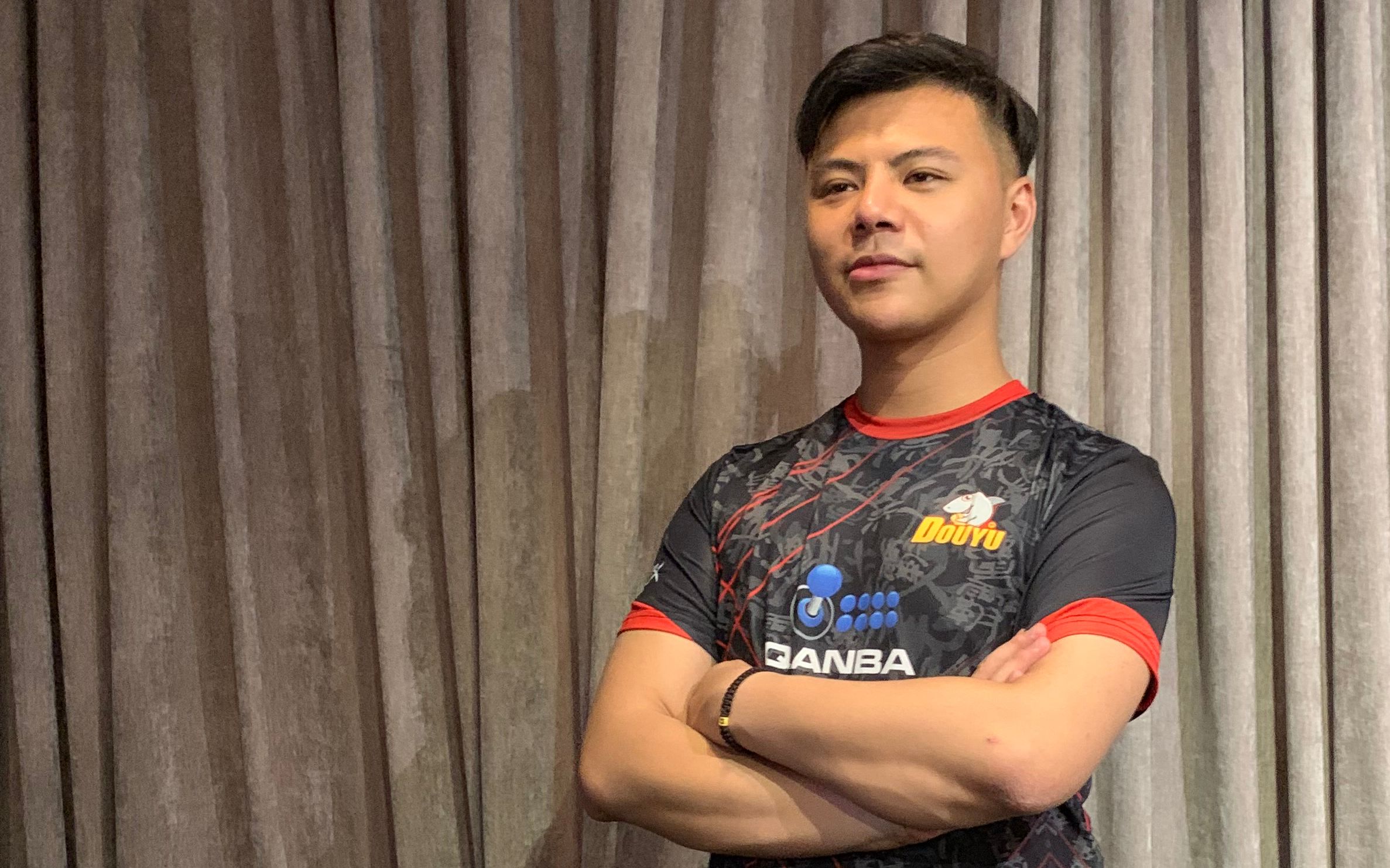 拳皇14中国小孩去美国就是拿冠军的