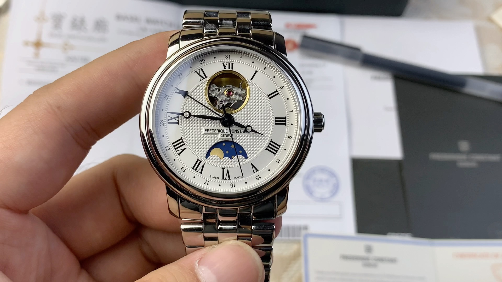 康斯登百年典雅心跳镂空月相机械男表