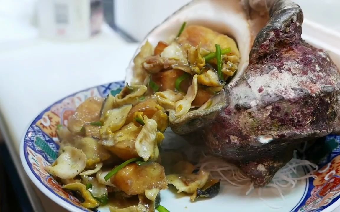 日本街头小吃-海蜗牛刺身,看起来不错!(下)