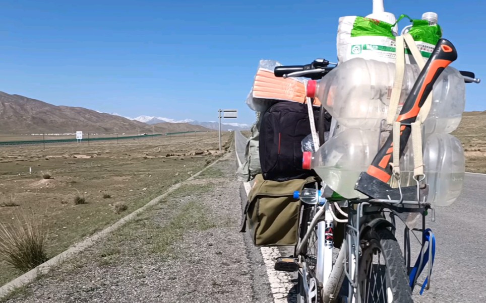 重装骑行京拉g109线,骑行几十公里长下坡,到达茶卡盐湖!