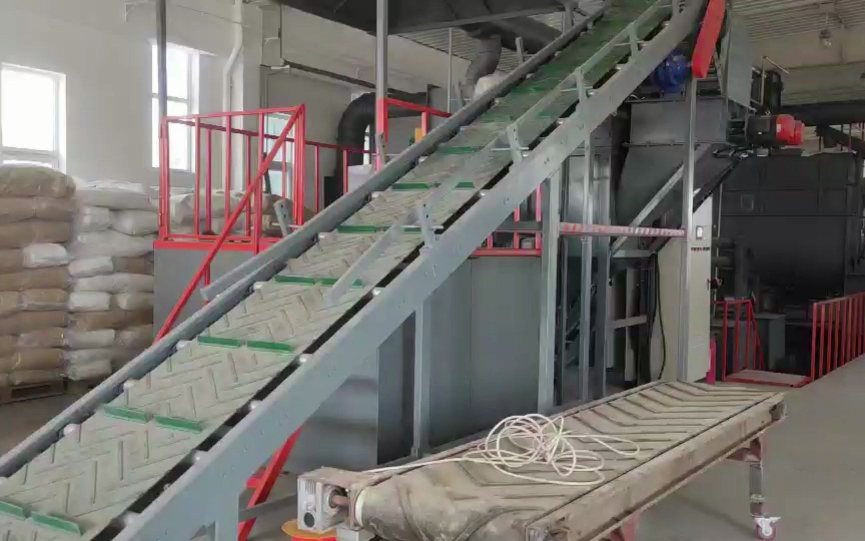 袋装水泥自动拆包机,自动拆袋机实拍