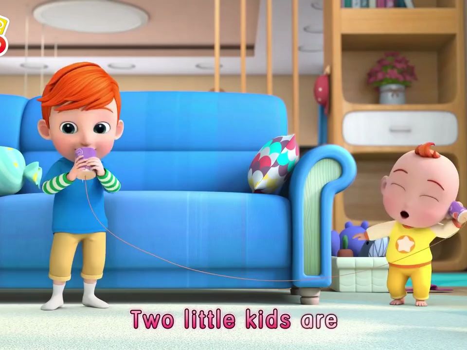 two little kids talking on the toy phone ring ring   mo