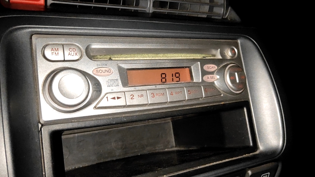 本田两厢飞度收音机时间调整方法演示