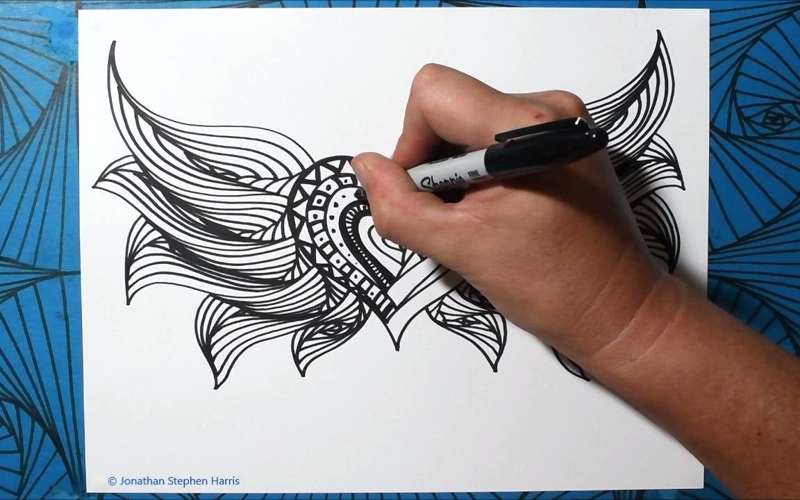 如何绘制带有翅膀的心形励志螺旋绘图设计