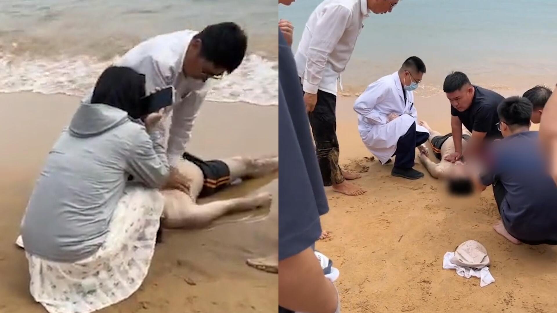 男子入海游泳不慎溺水,躺沙滩上一动不动,游客和医生紧急施救