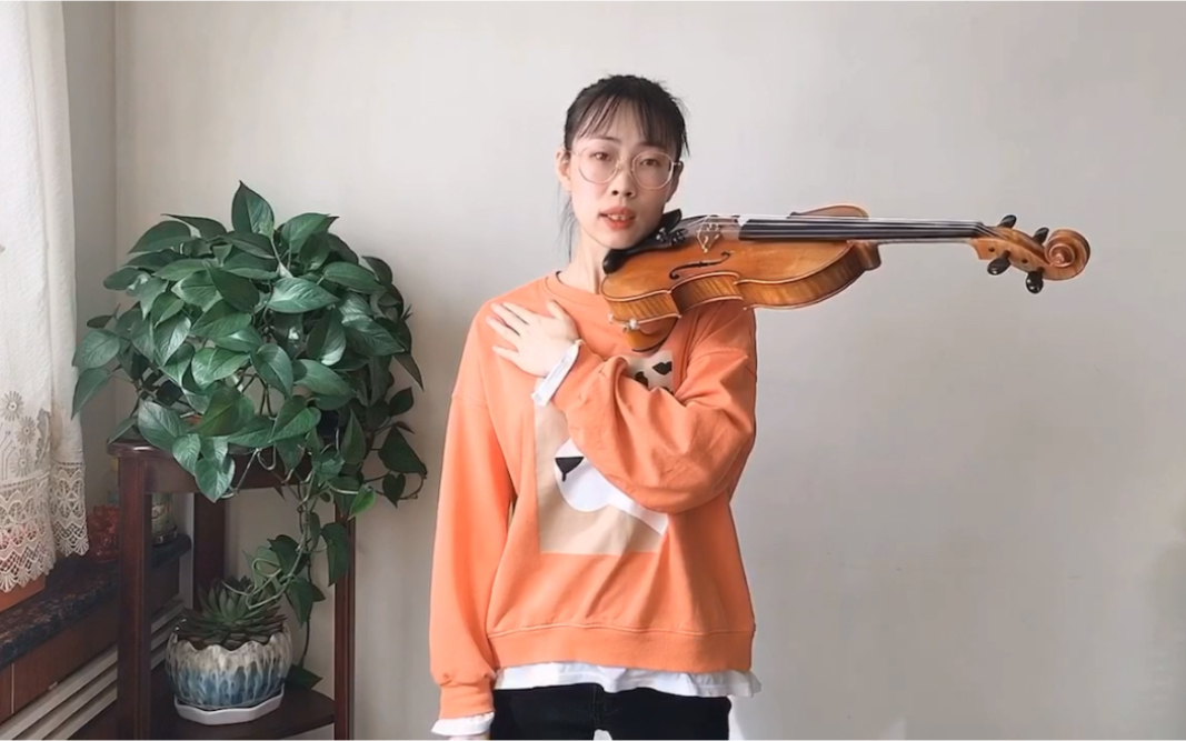 小提琴持琴姿势图解图片