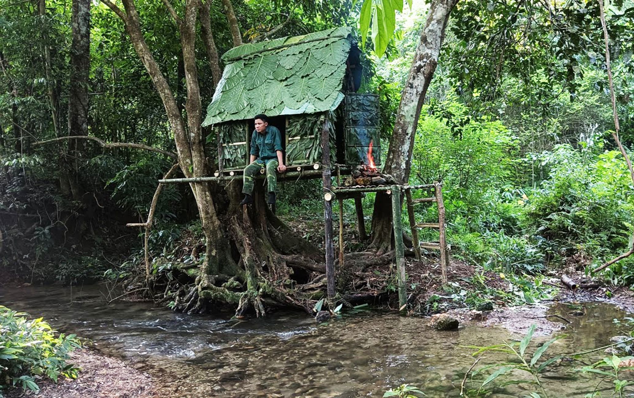 在溪流附近搭建竹屋