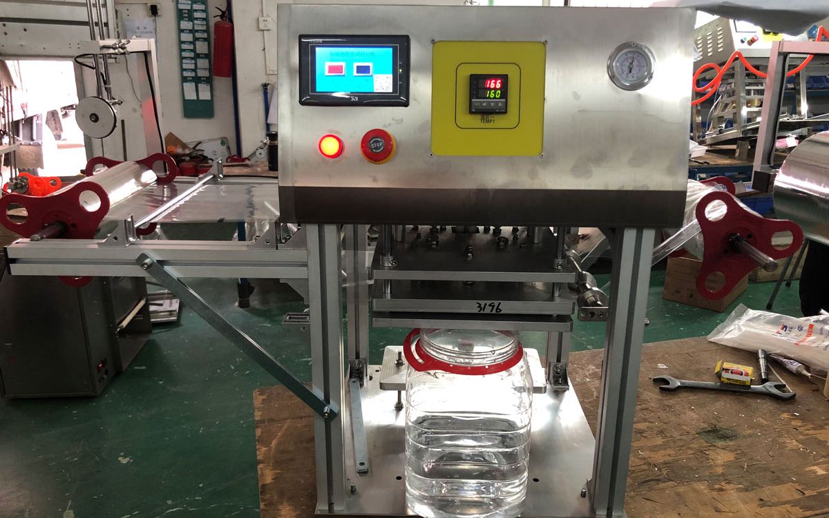 透明塑料桶封口机 酱料桶封膜机 食品桶密封机 励勤包装