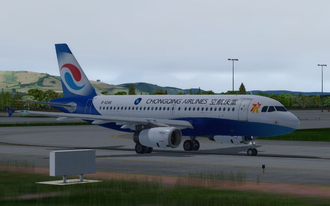 重庆航空a319-132风雨天长长长飘落地丽江三义