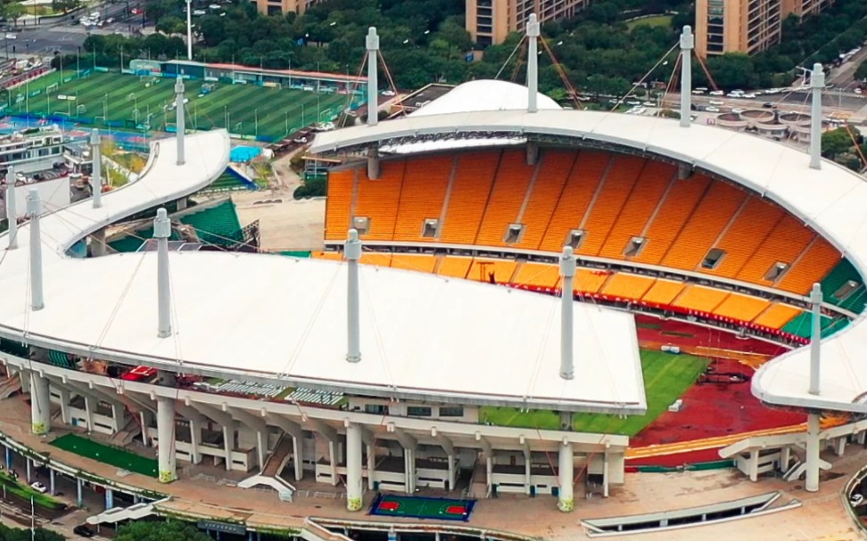 台州市体育中心,高耸的桅杆,紧蹦的悬索,流动波浪般的看台等建筑造型
