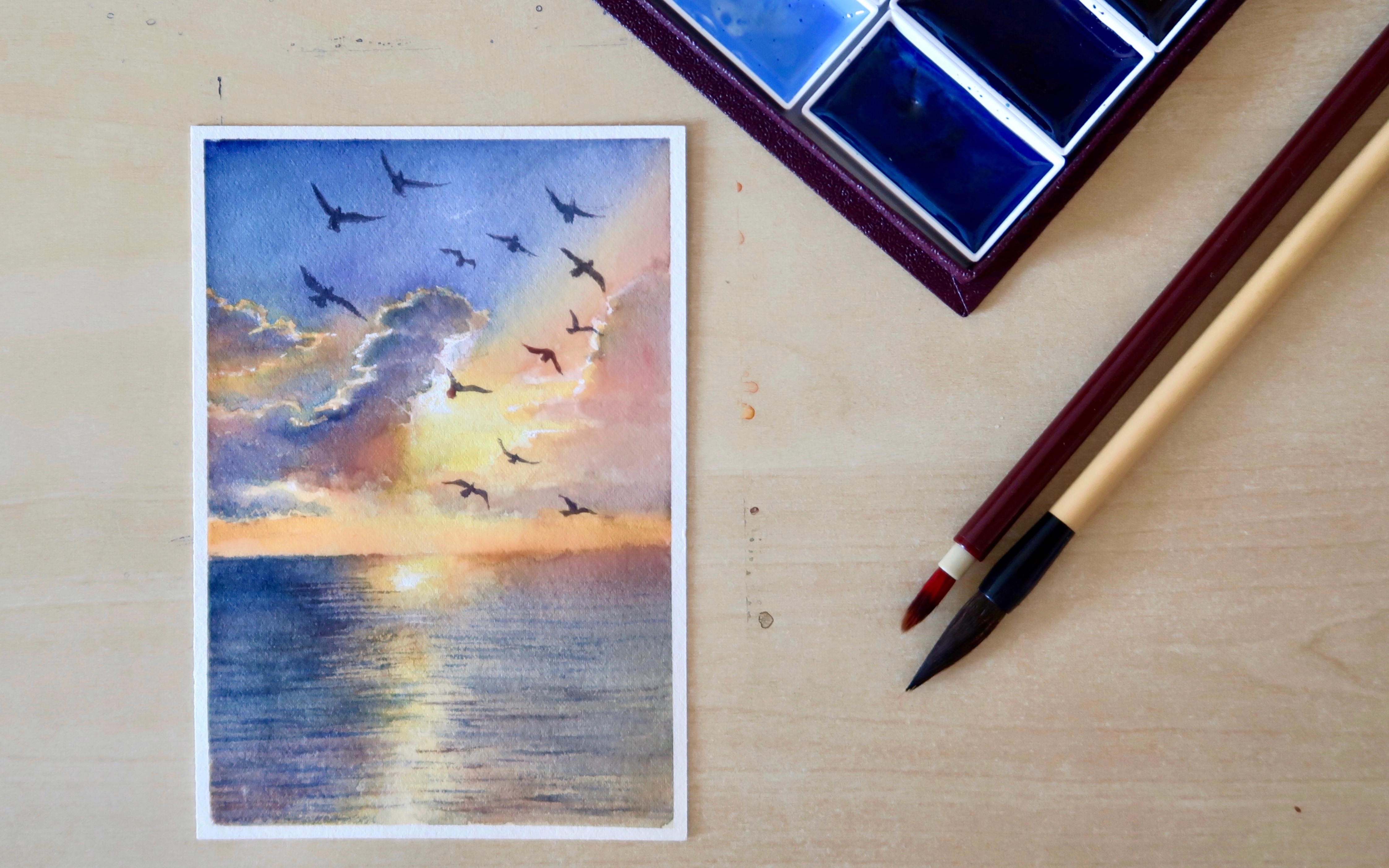 海上日出用渐变色绘画图片