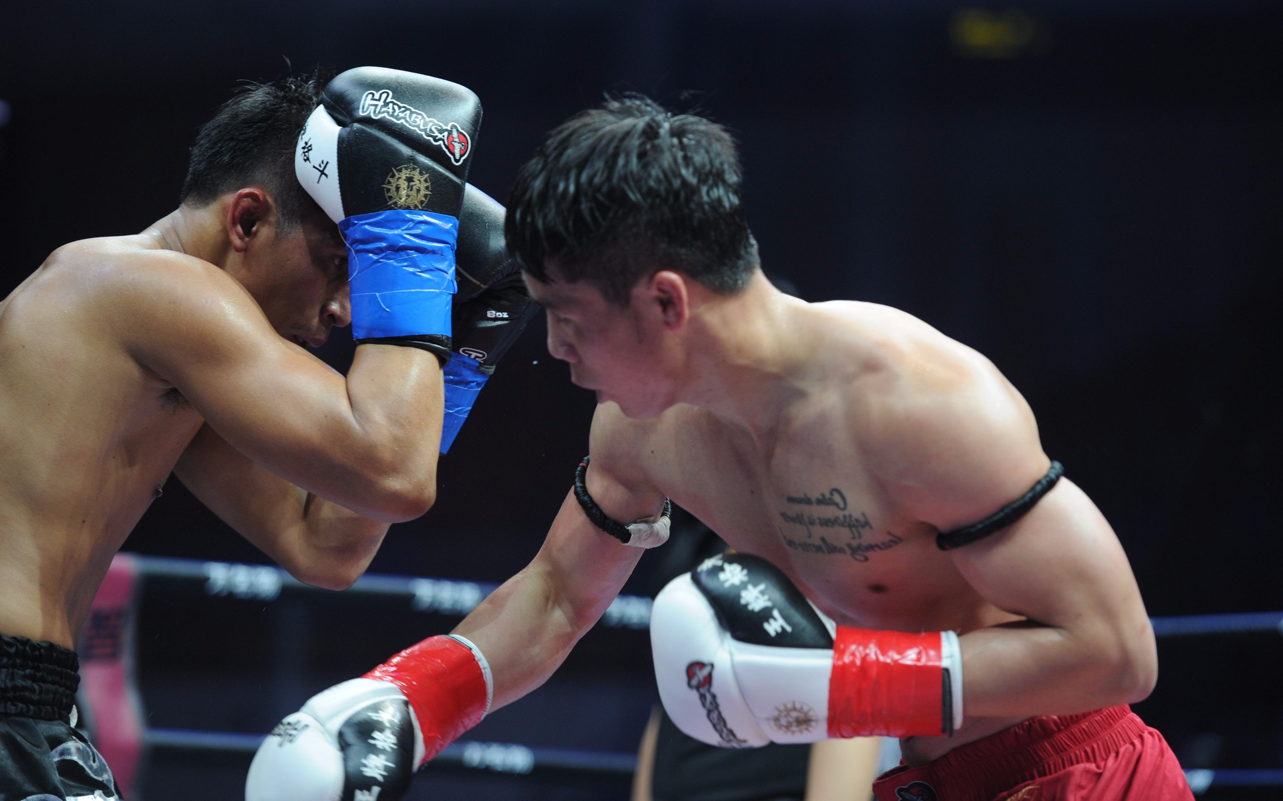 邱建良终结泰拳"国宝"肯姆在华不败!首回合转身一招ko认输!