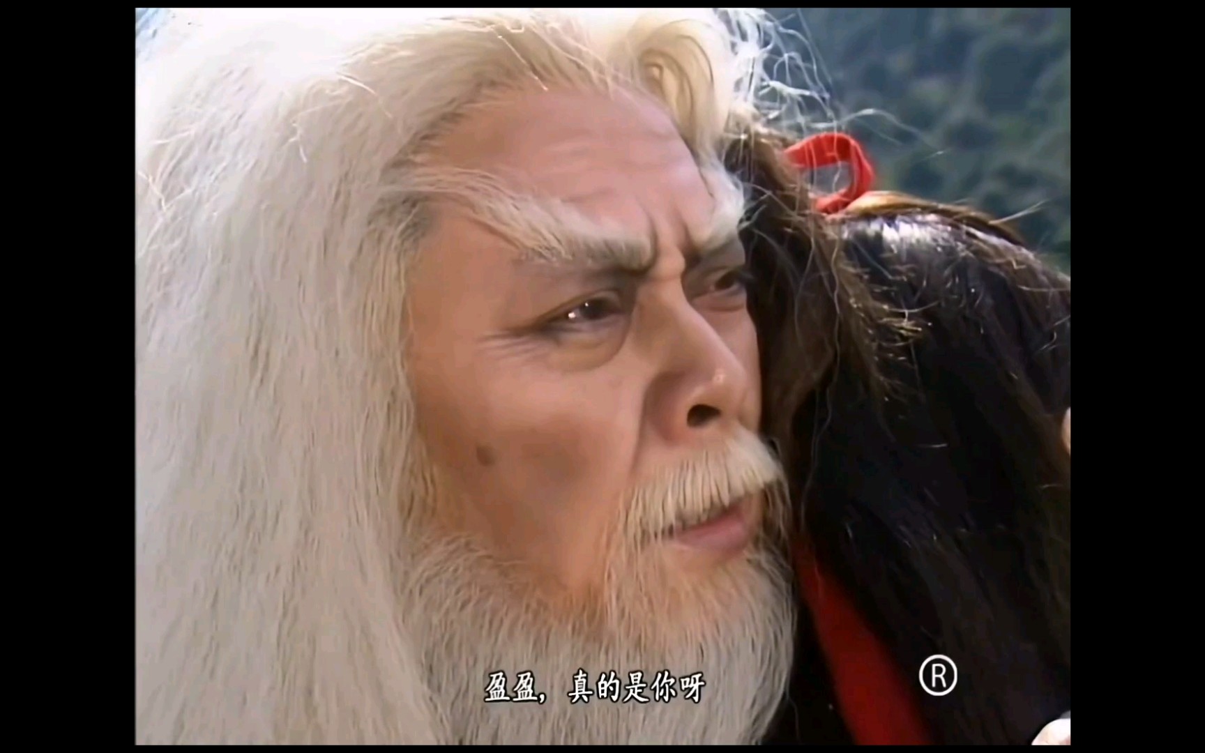 任盈盈和任我行父女重逢令狐冲已取得老丈人的欢心