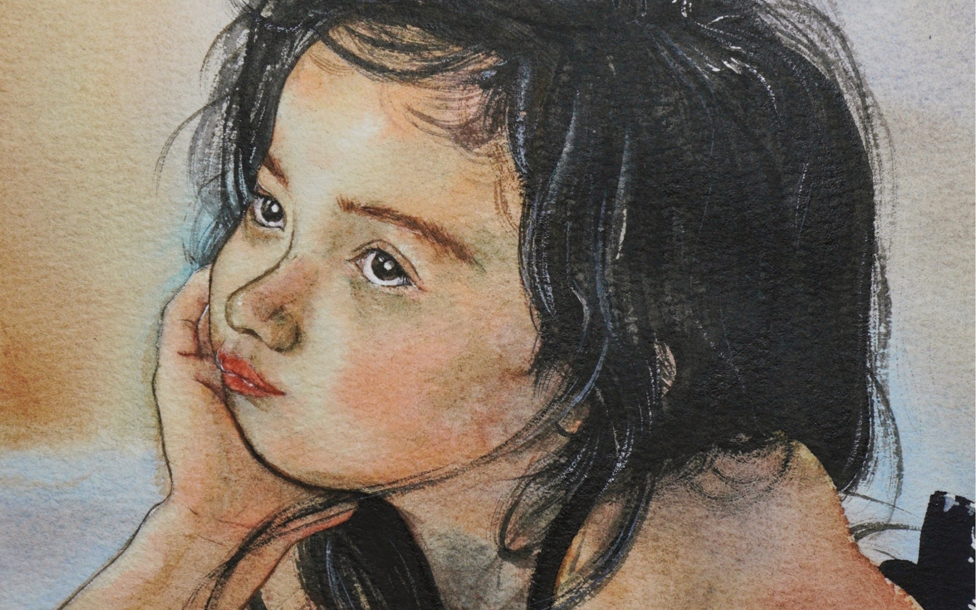 圆脸小女孩托腮