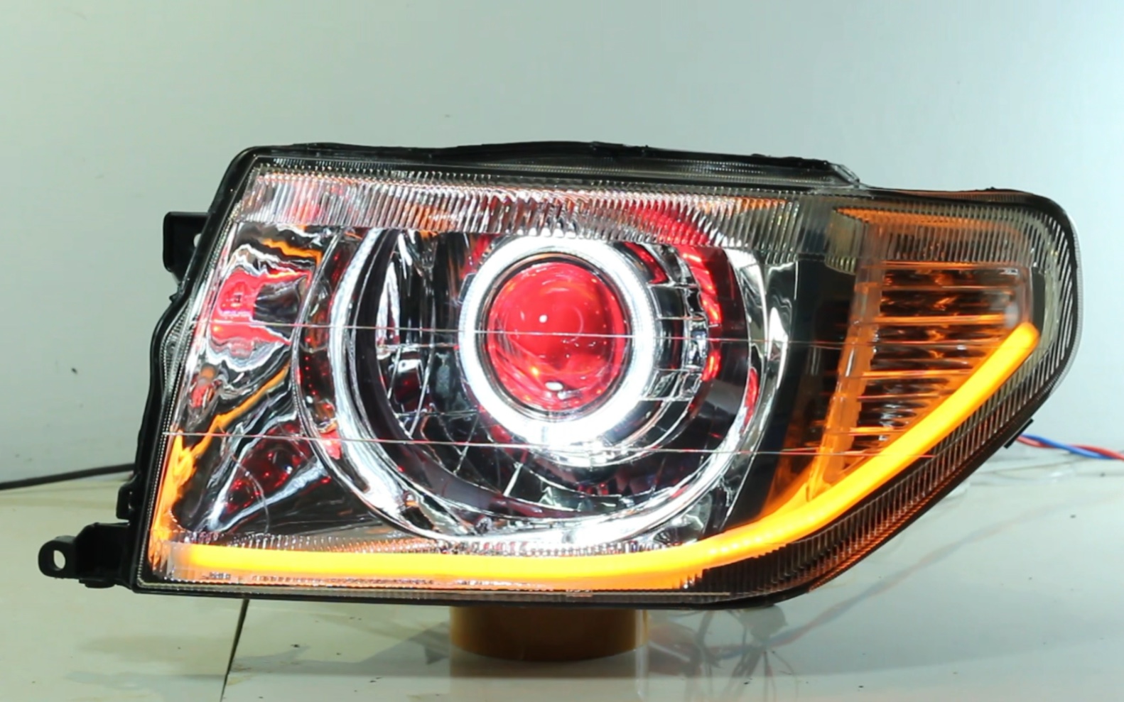 猎豹飞腾大灯总成改装led双光透镜天使恶魔眼日行灯