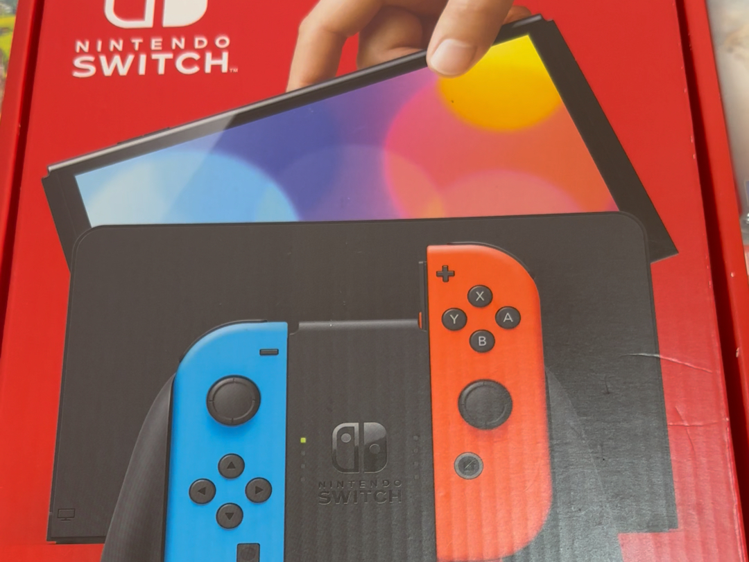 [图]出switch oled日版红蓝配色主机，如果没有下载最新版本游戏的需要，可以不更新主机哈